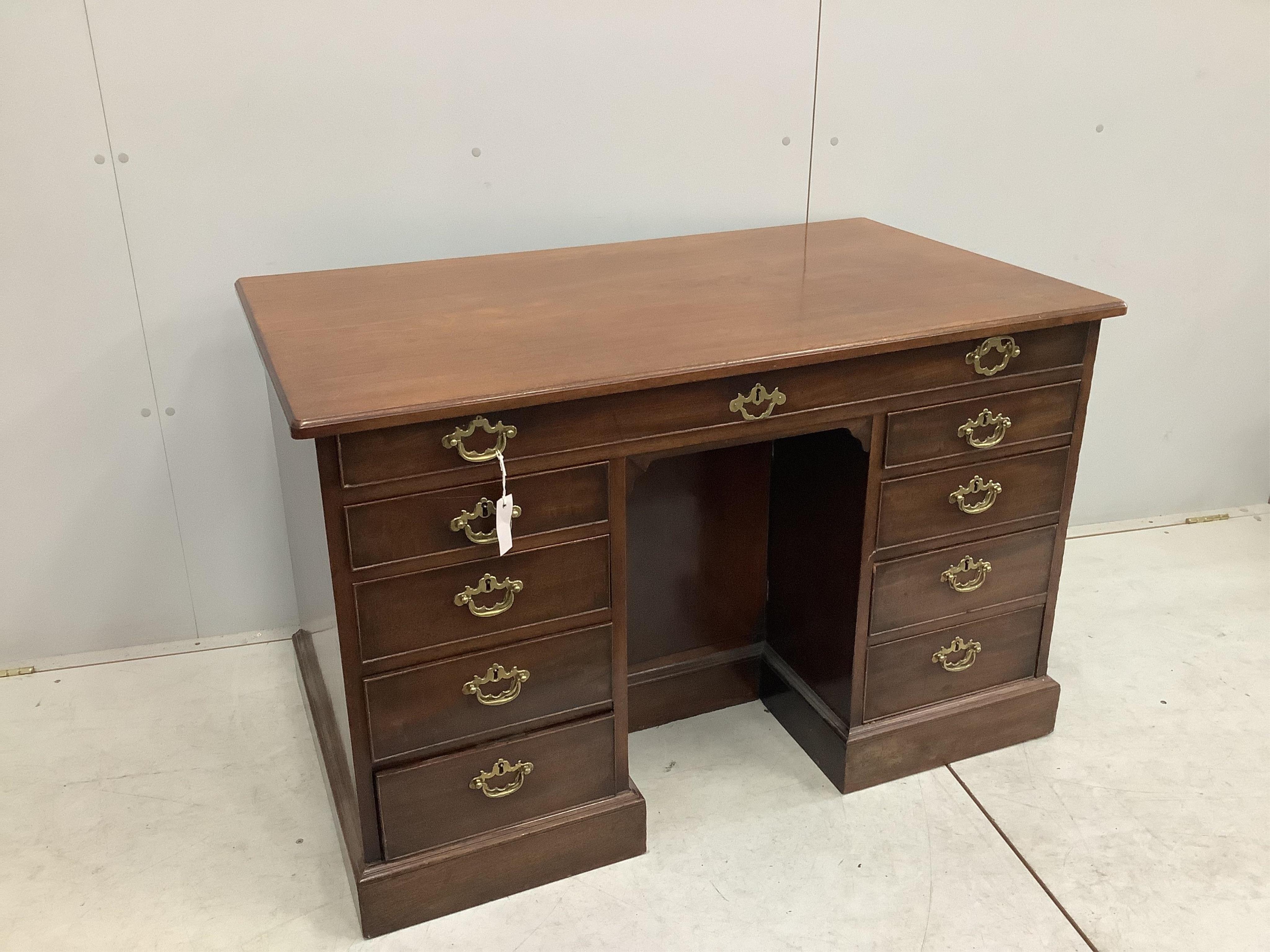 A George III mahogany kneehole desk, width 117cm, depth 67cm, height 74cm. Condition - fair to good